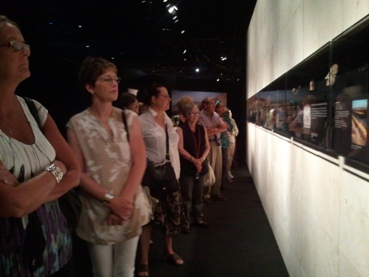 Congregation members viewing artifacts