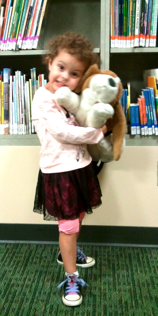 Little girl and Libby the Library Hound